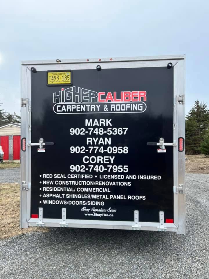 Higher Caliber Carpentry and Roofing Trailer with Logo and Contact Information on it. 