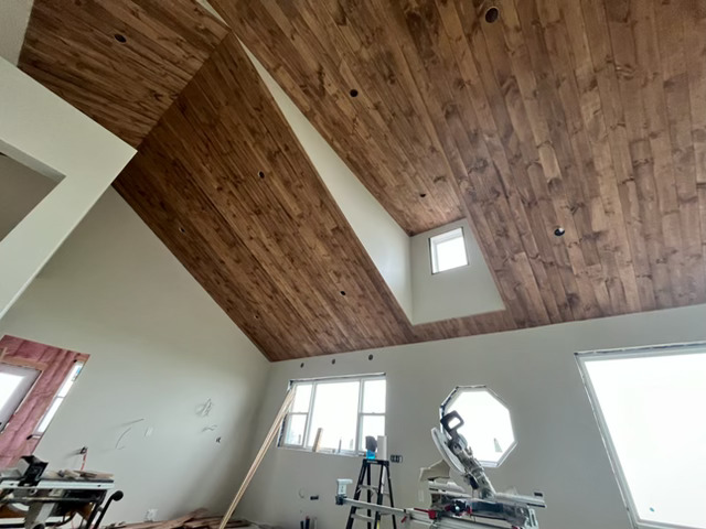 interior of a new house build showing the ceiling being finished
